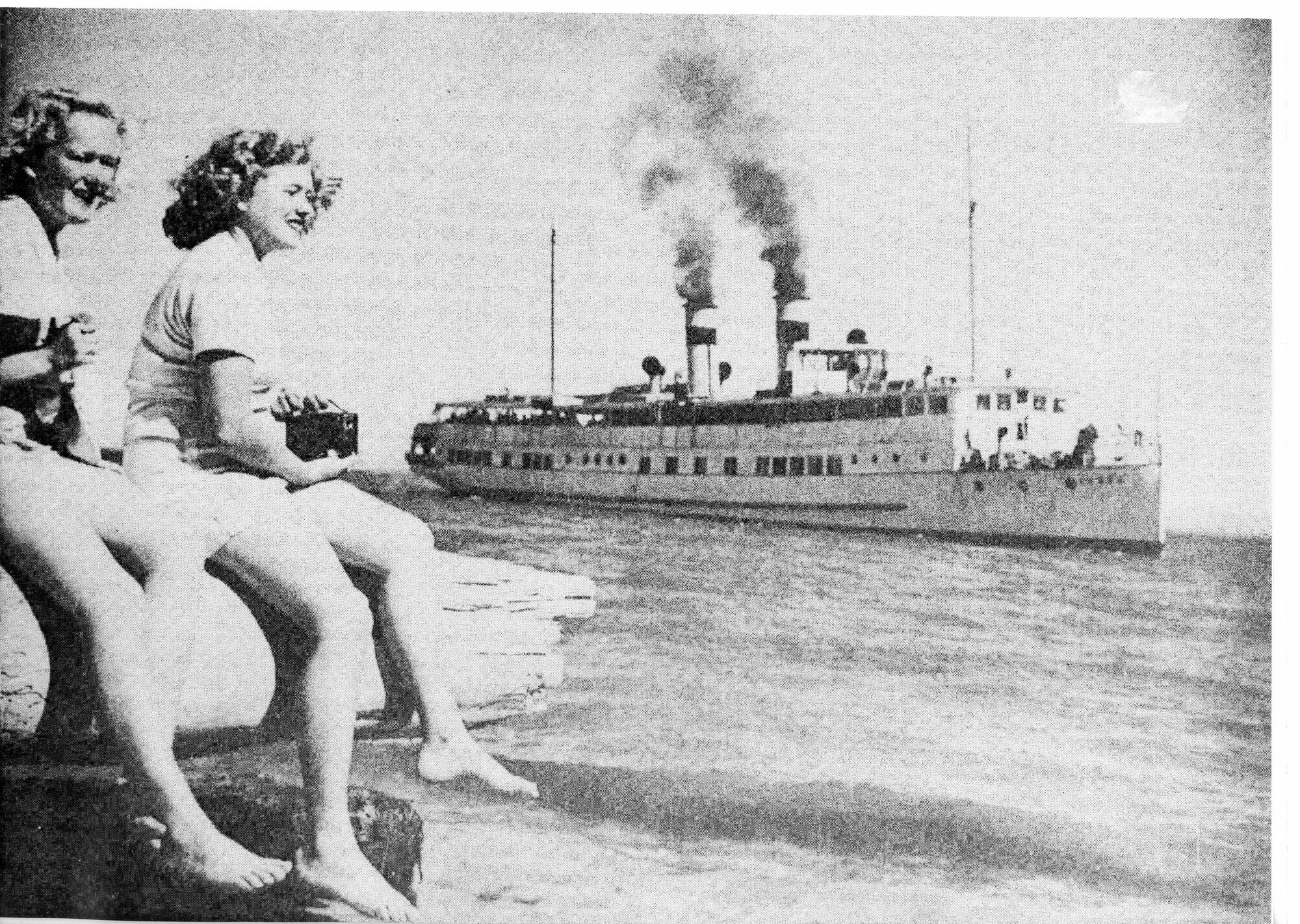 Two girls with steamship