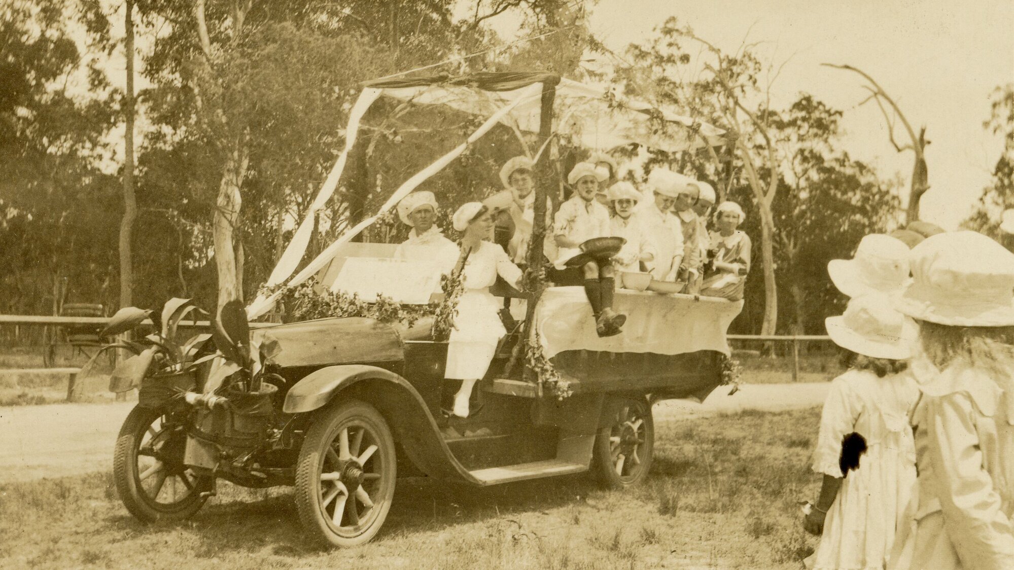 Decorated motor lorry (truck) at a carnival in Caboolture, ca. 1920s