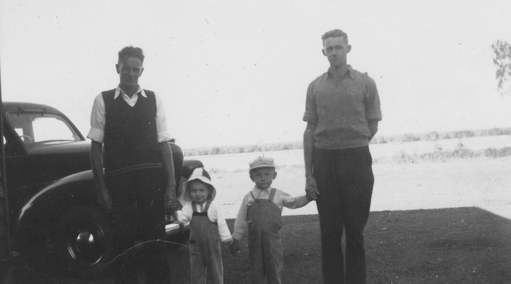 Group of people standing near car on the Esplanade at Donnybrook, ca. 1949
