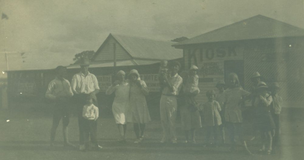 Group gathering in front of the Wallin's Kiosk