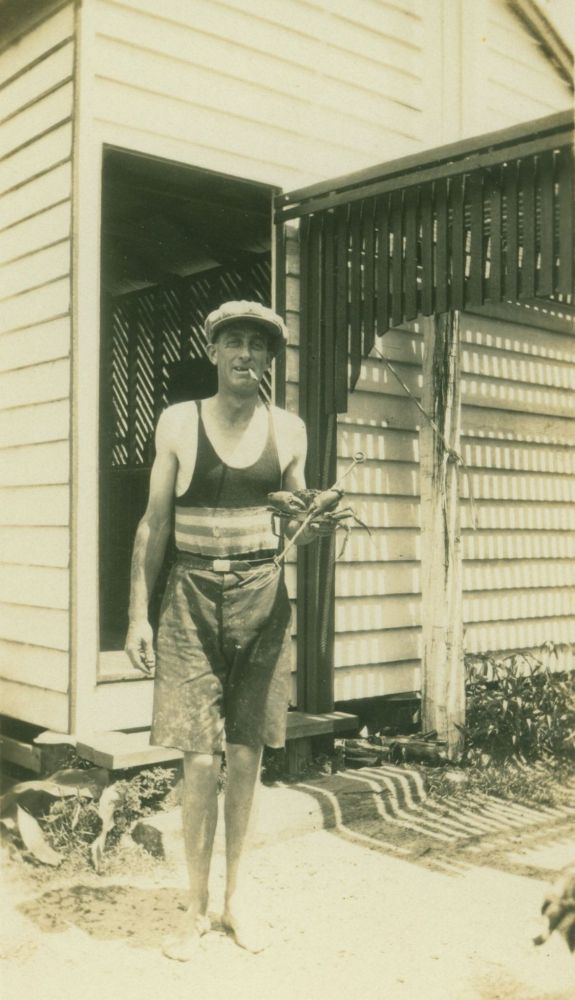Mr Billy (?) Metcalf holding a mud crab