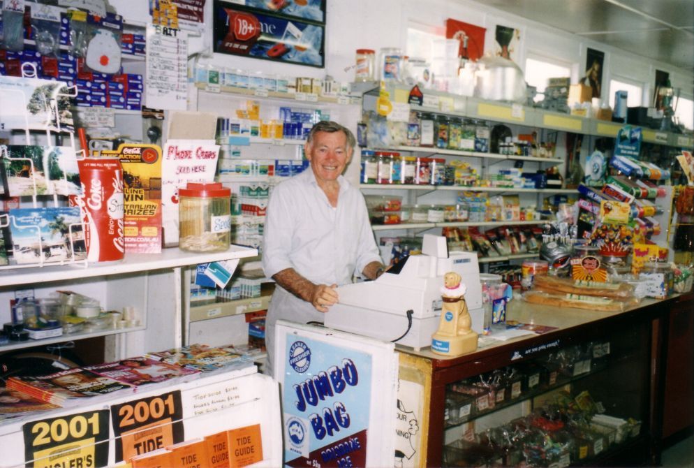 George Turnbull at the cash register in the kiosk