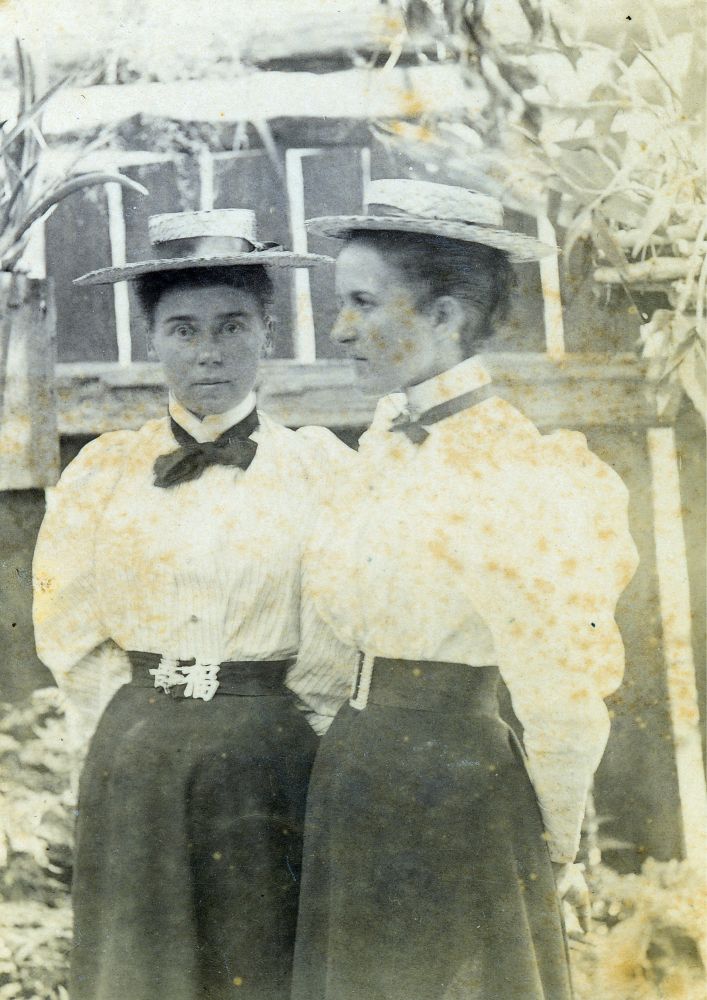 Two ladies wearing hats