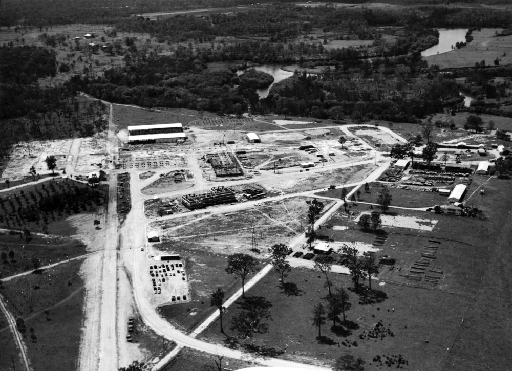 Aerial view of early construction of the APM Petrie Mill