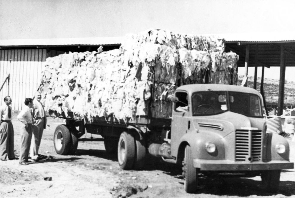 Whelan's Transport truck delivering a load of paper bales for recycling, 1952