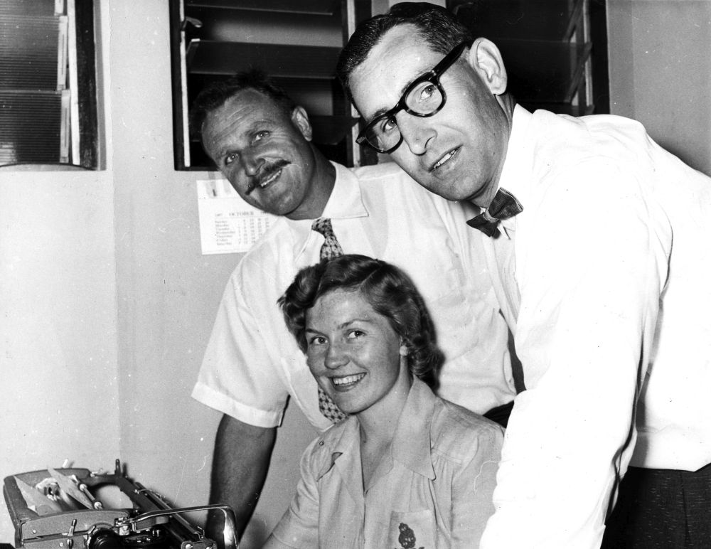 Al Blumer and Harry Thomas (with an unidentified office worker)