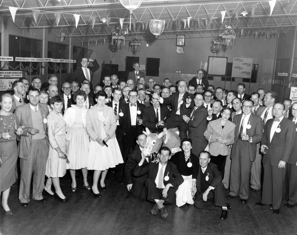 A group of visiting customers to the Petrie Mill
