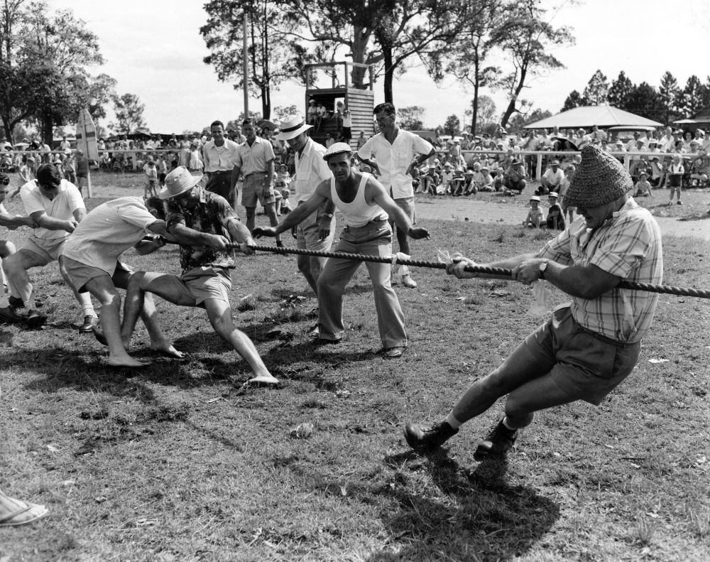 Tug-of-war at the Christmas party, 1957