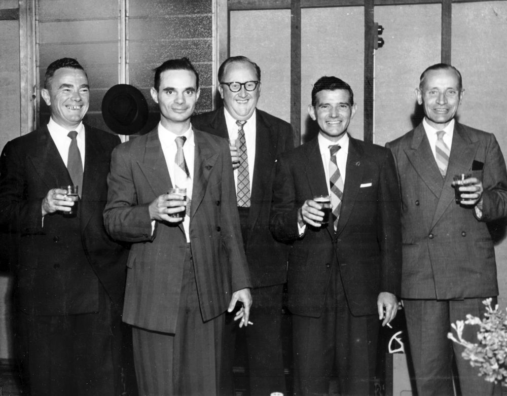 Max Powell, Frank Norton, Tom Jones, unidentified person and John Sollers at a function