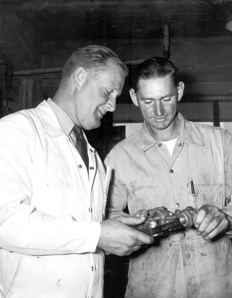 Norm Vessey and George Rosser at work