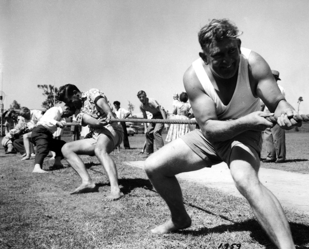 Tug-of-war at the Christmas party, 1959
