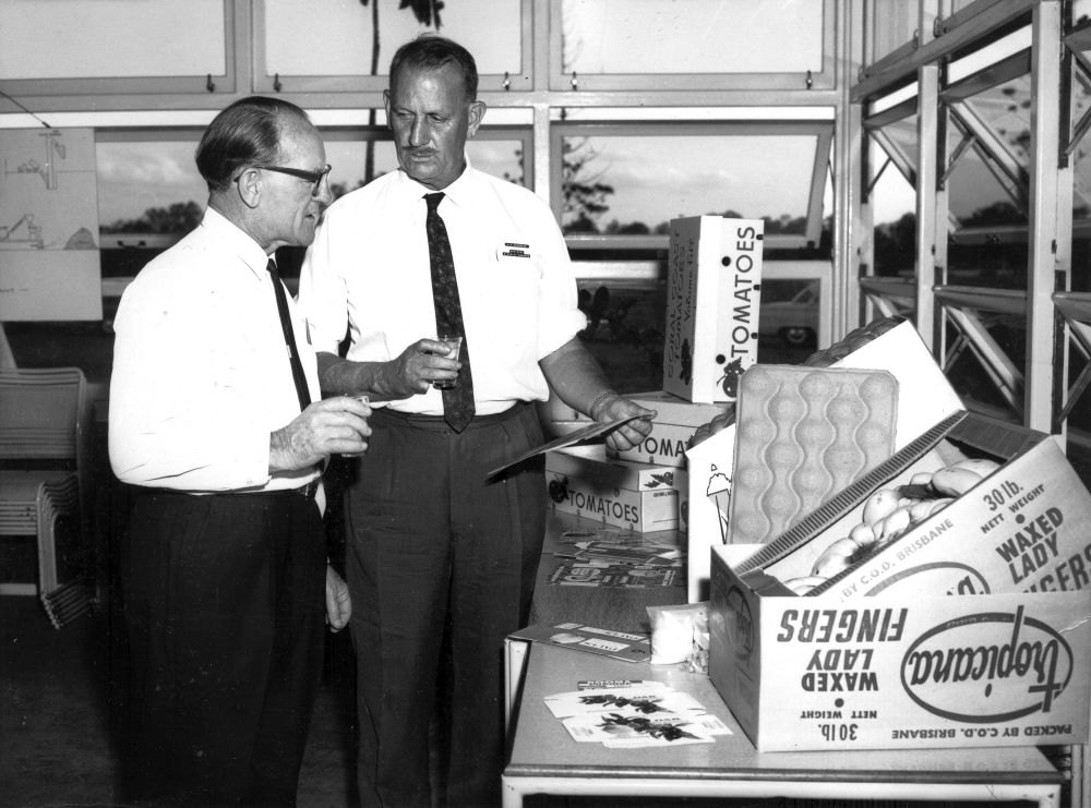 Sir David Nicholson, M.L.A. (left), with Gus Gehrmann (right) during a visit to the Petrie Mill