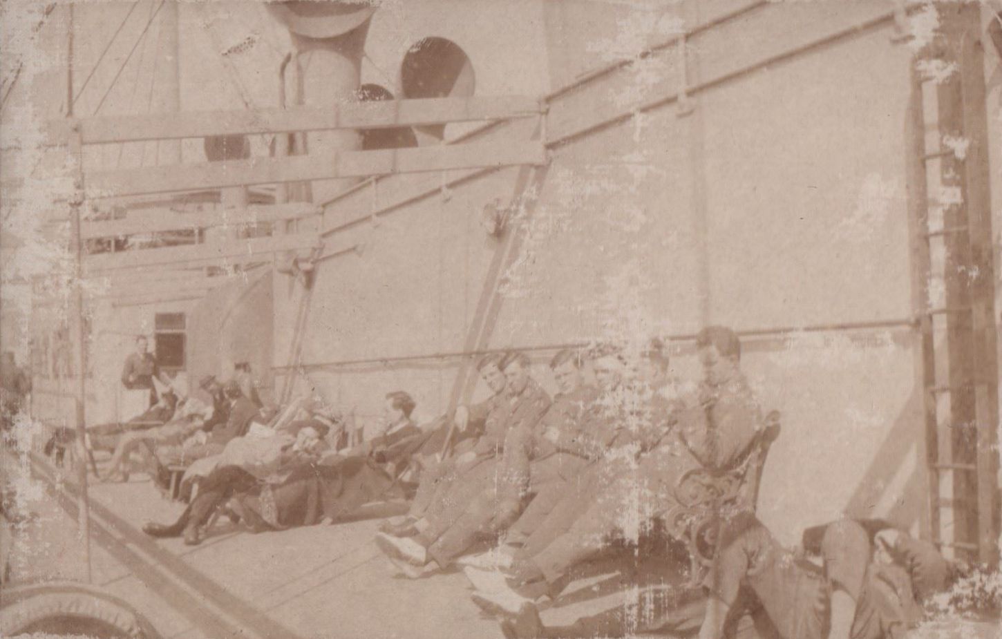 Service personnel relaxing on deck