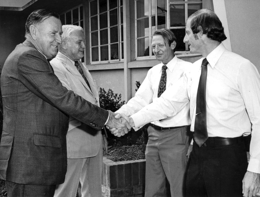 Kenneth Burgoyne Tomkins, M.L.A., and Victor Bruce Sullivan, M.L.A., meeting I.D. Grundy and Bruce Jeanes