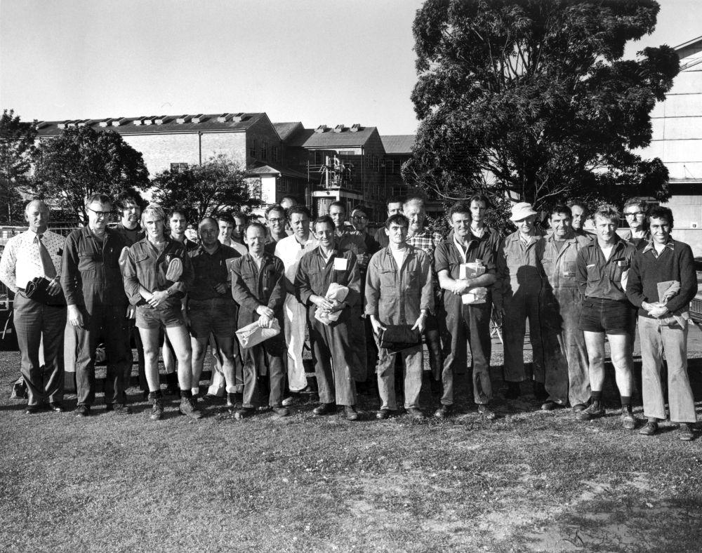 Large group of workers at the Petrie Mill, 1976