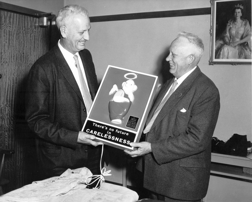 Honourable K.J. Morris, M.L.A. (right) with Gus Gehrmann