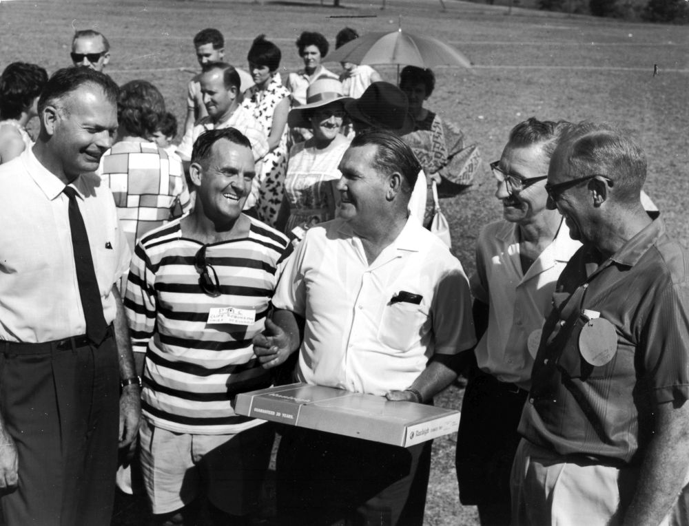 Presentation to Johno Johnson for sterling job as Santa for the past 12 years