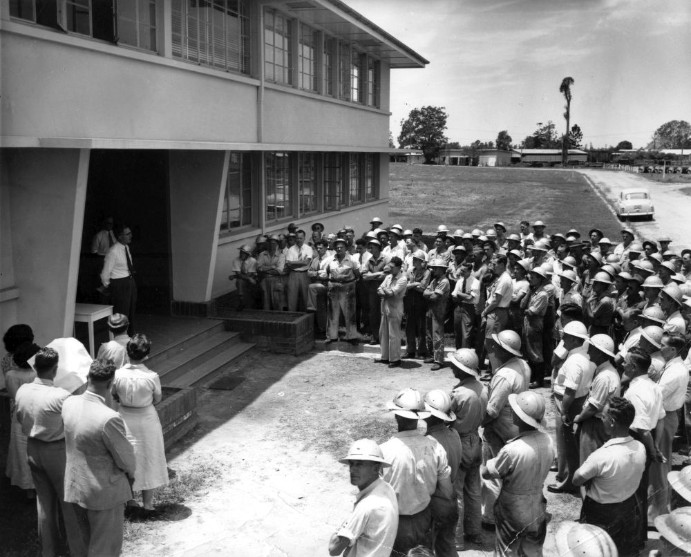 Mill employees listening to an address from APM Managing Director, John G. Wilson