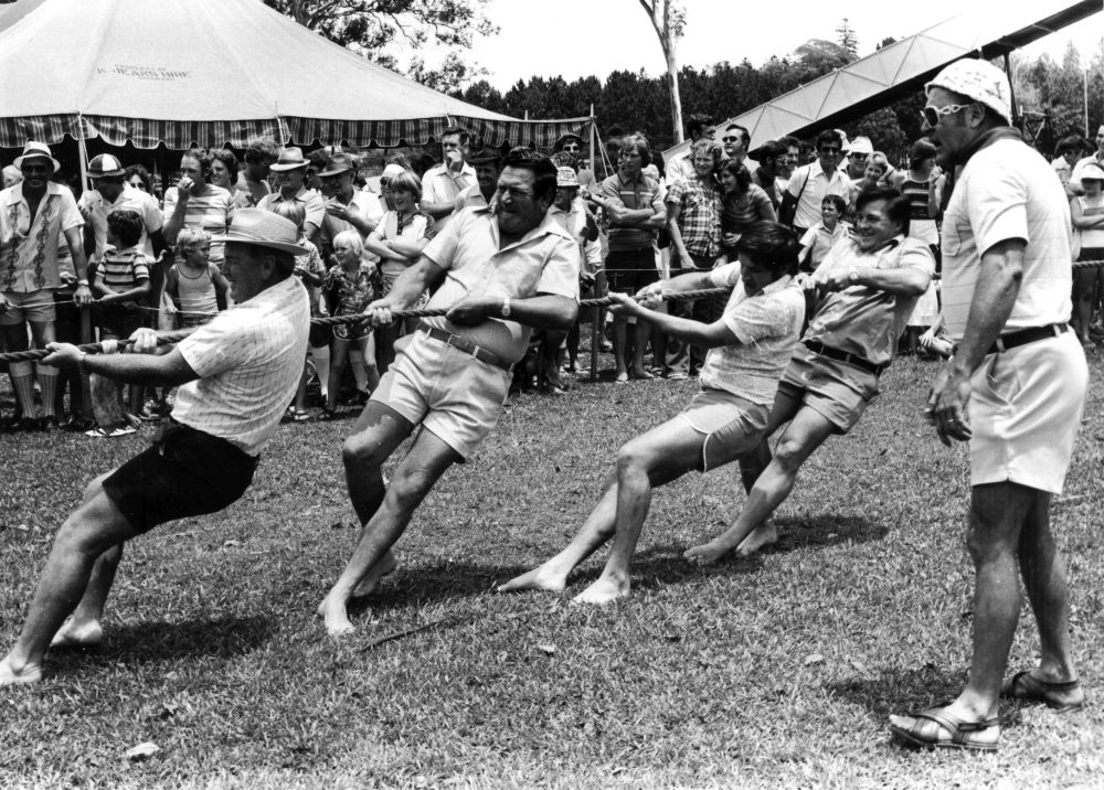 The Engineering Department's team winning the tug-of-war at a Christmas party sports day.