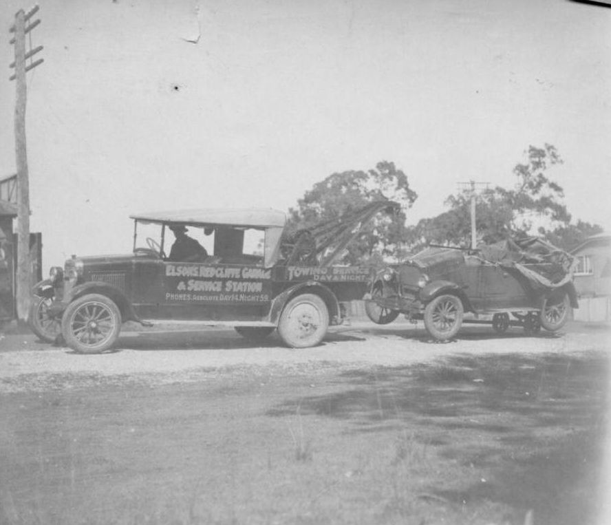 Damaged vehicle under tow by Elson's Redcliffe Garage &amp; Service Station tow truck