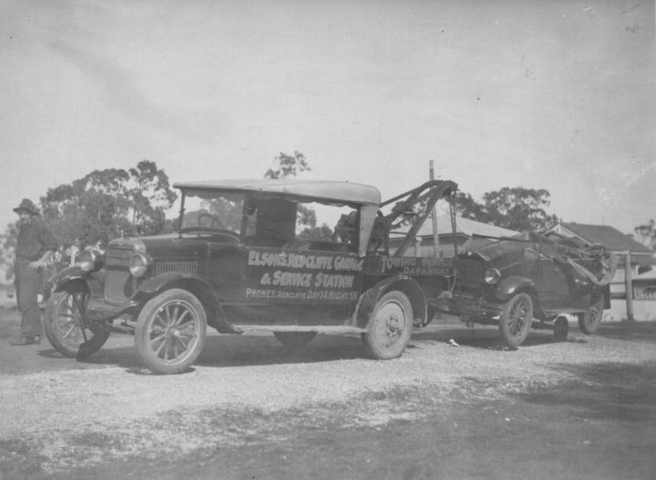 Damaged vehicle under tow by Elson's Redcliffe Garage &amp; Service Station tow truck