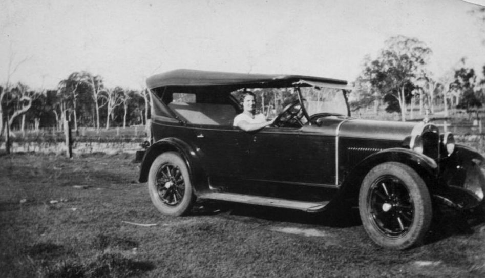 Elva Elson behind the wheel of a car