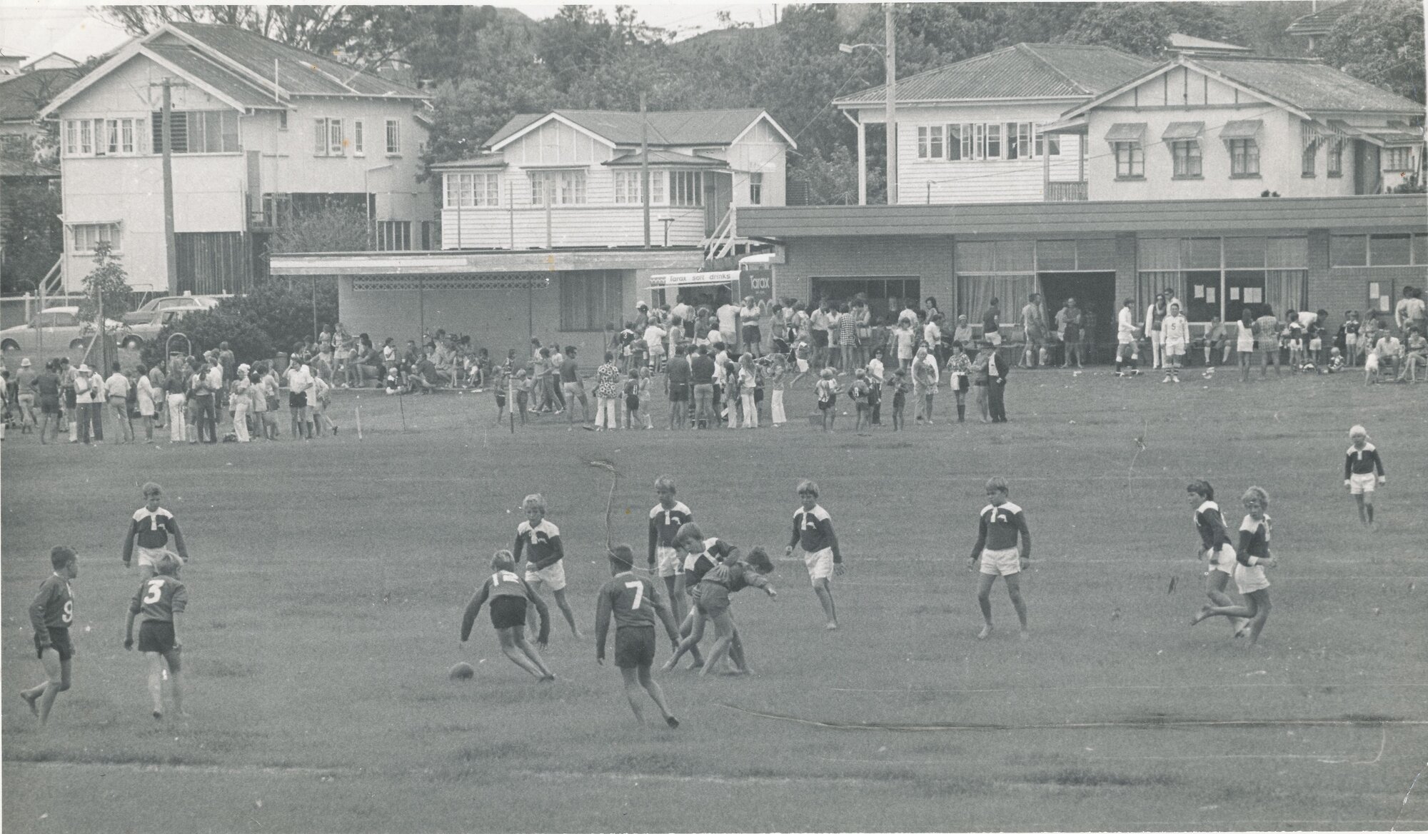 Children playing rugby league