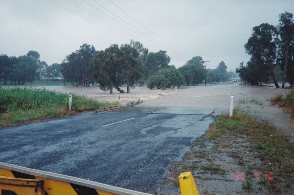 Flood waters over Bells Pocket Road Strathpine