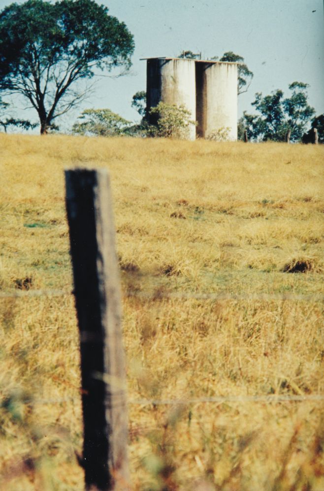 Silos in a paddock, ca. late 1980s