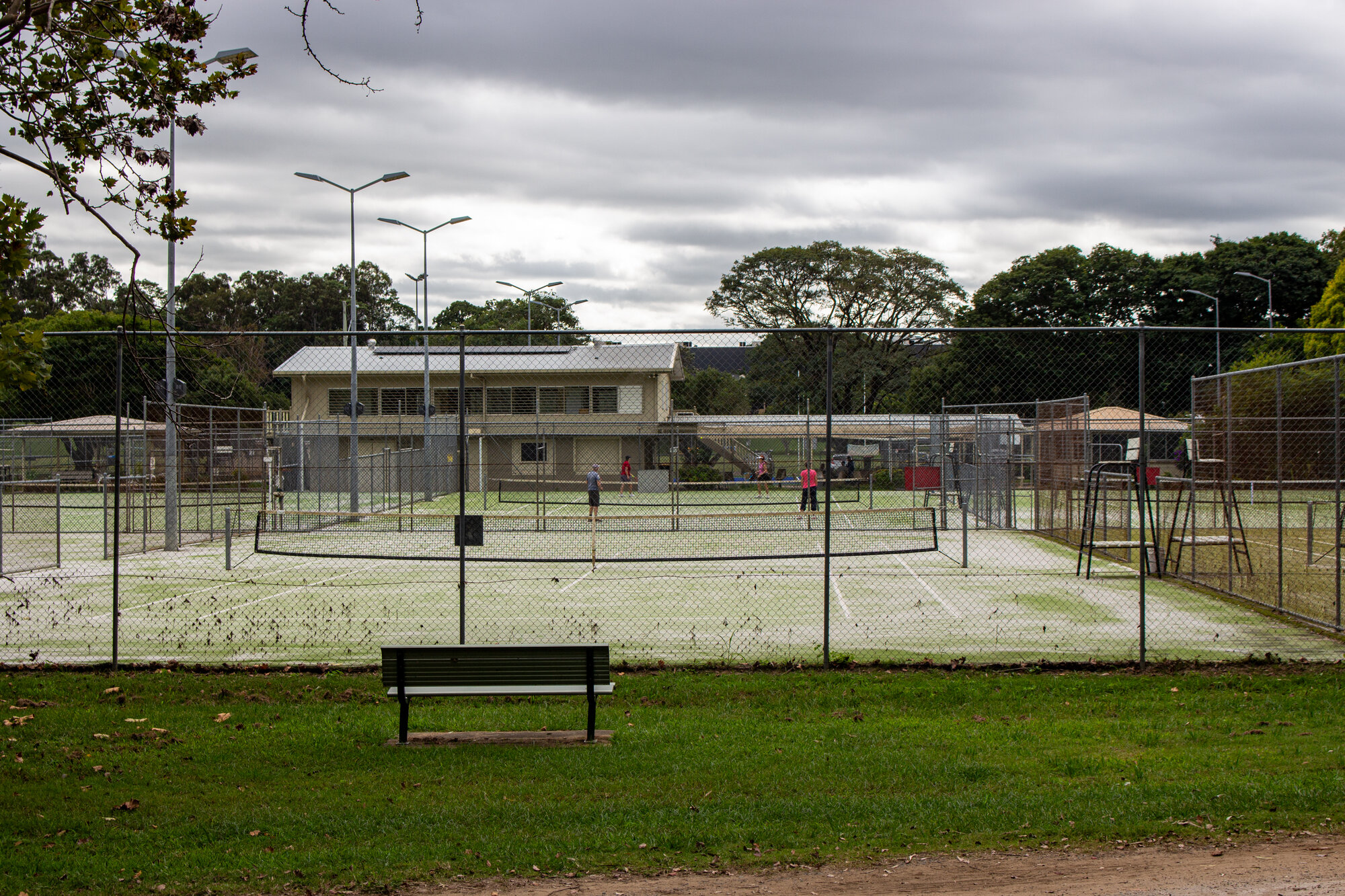 Game of tennis in progress at the tennis courts within the Caboolture Sports Complex - 15 Riverview Street Caboolture