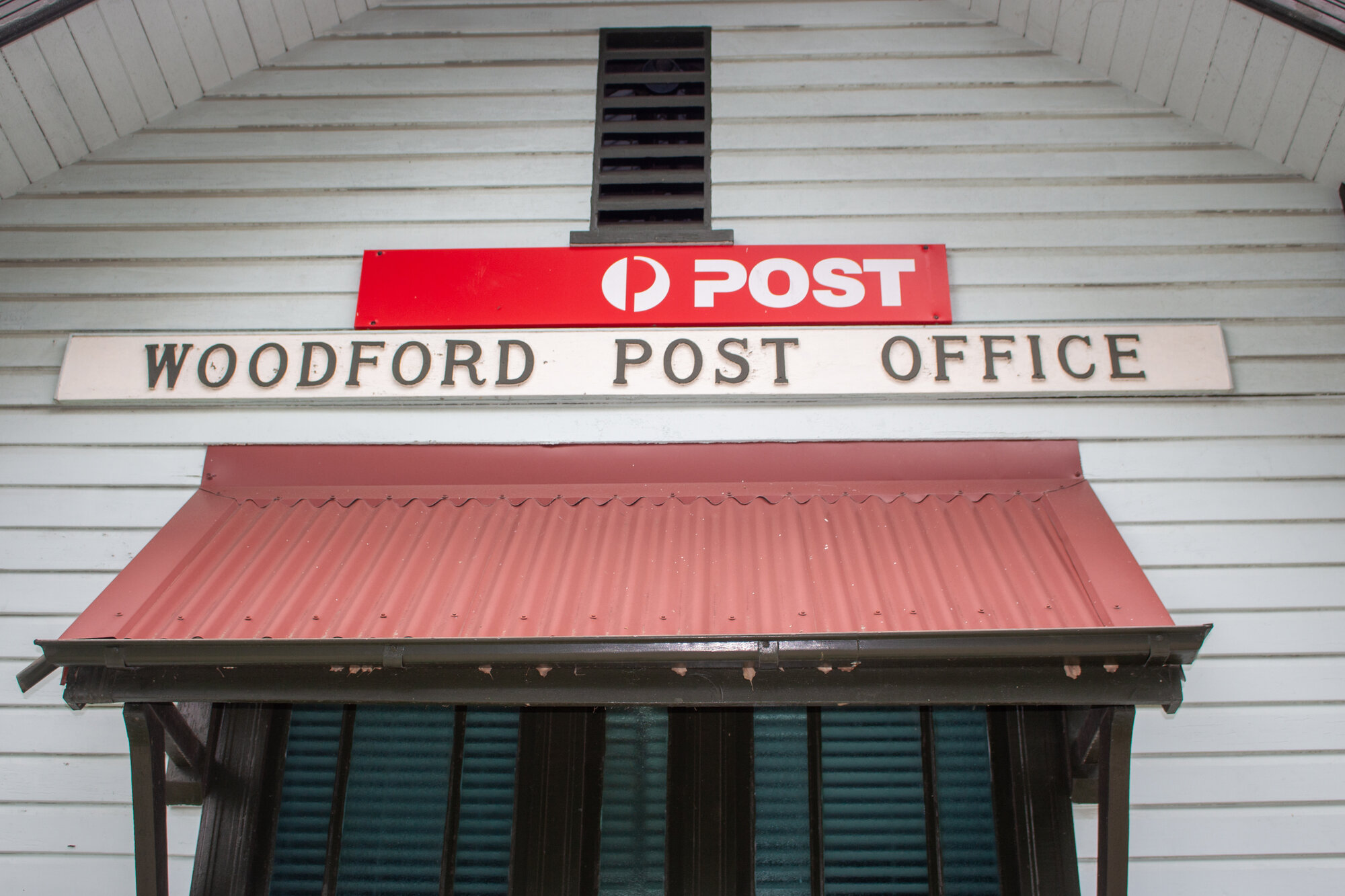 Woodford Post Office - 113 Archer Street Woodford - close-up view of sign