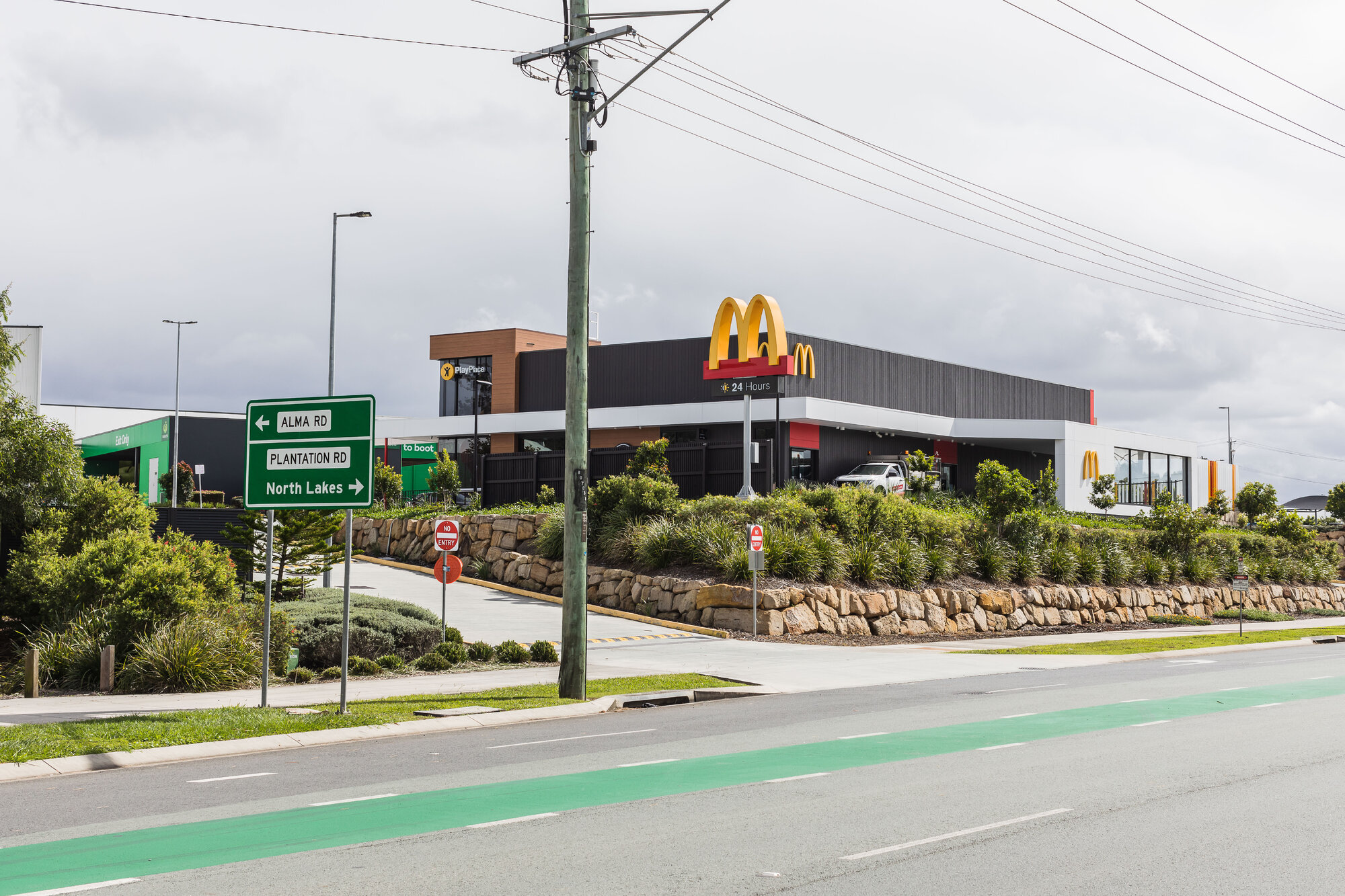 Close-up view of the McDonald's restaurant &amp; takeaway located in the shopping centre precinct at 1 Alma Road Dakabin