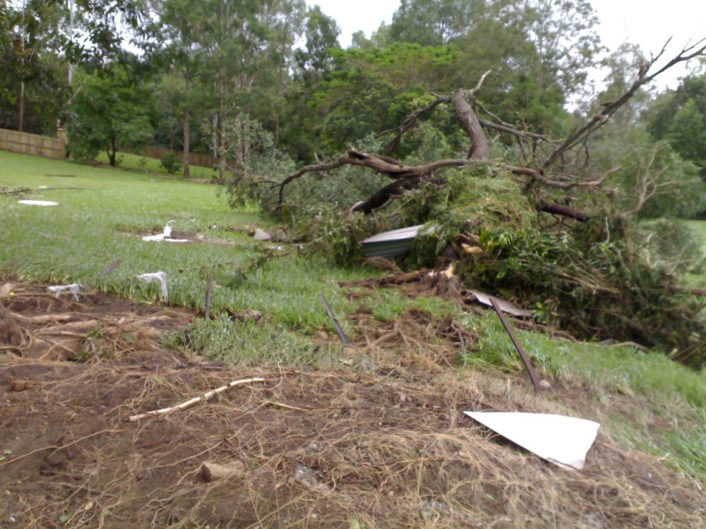 January 2011 Flood Event - Debris left after the North Pine River flooded the backyard at 25 Vores Road Whiteside