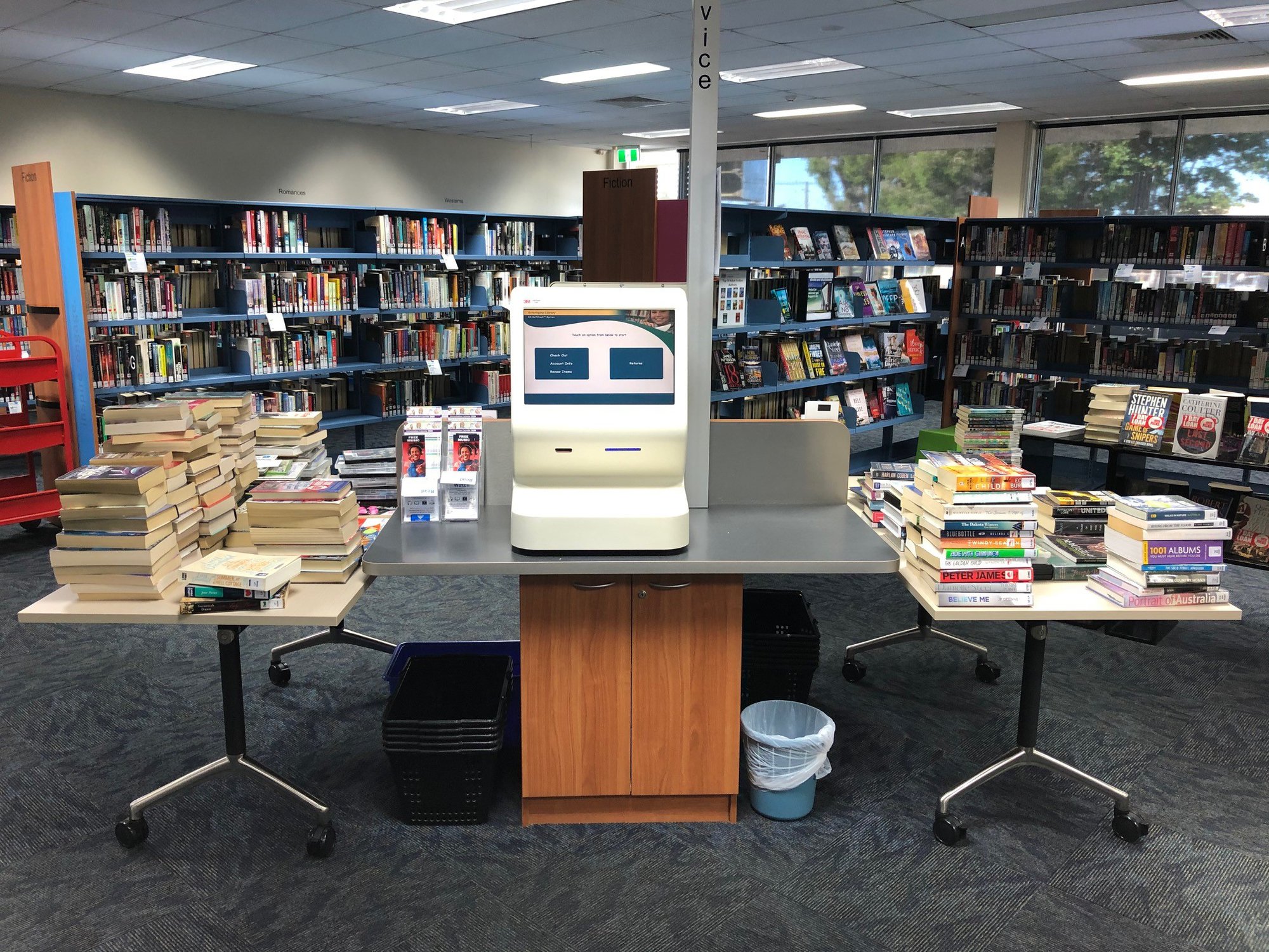 Strathpine Library - Station Road Strathpine - 15 April 2020 - after hours chute returns in quarantine for 72 hours empty shelving in background