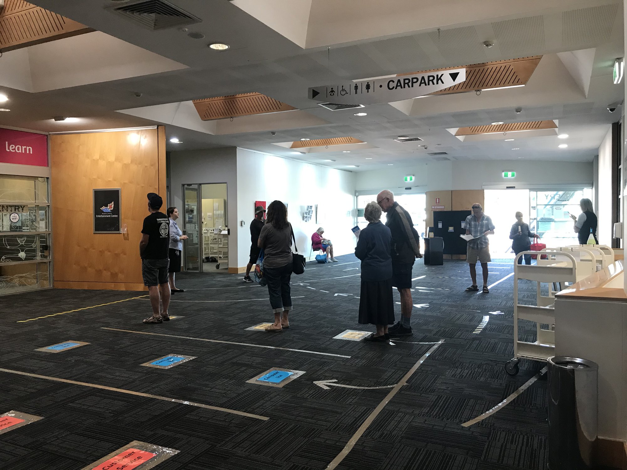 Redcliffe Library - Oxley Avenue Redcliffe - 16 May 2020 - reopening foyer customers queueing - 002