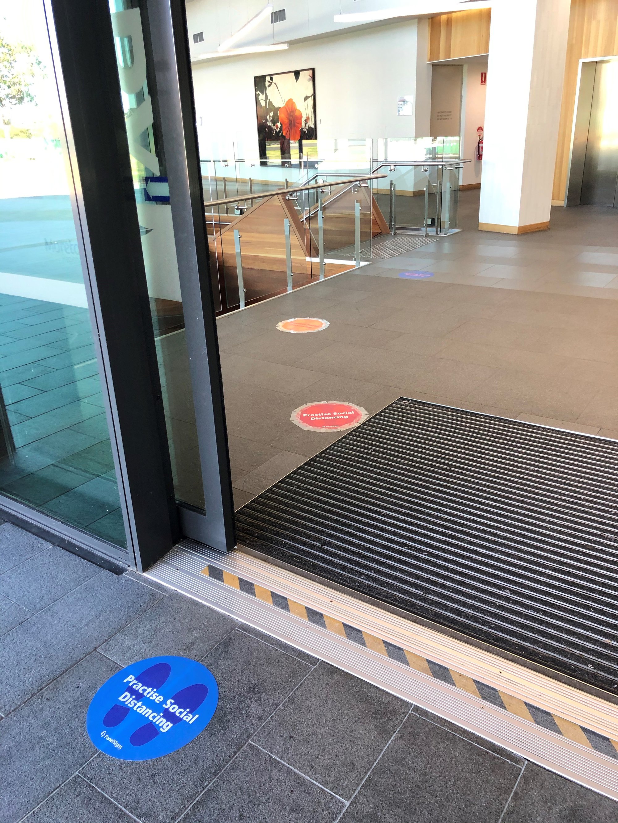 North Lakes Library - The Corso North Lakes - 15 May 2020 - reopening social distancing stickers entrance