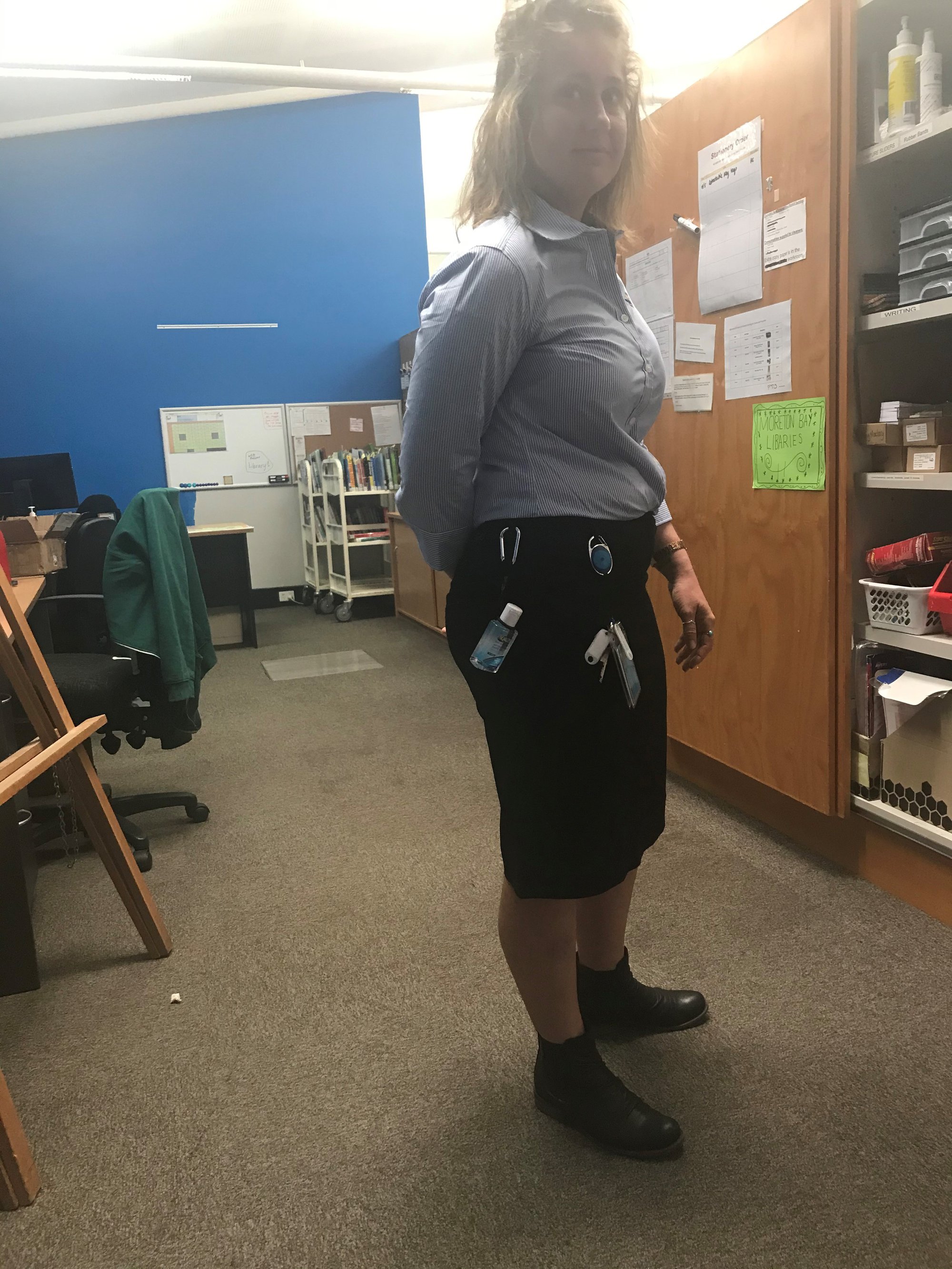 Redcliffe Library - Oxley Avenue Redcliffe - 16 May 2020 - reopening staff member with hand sanitiser