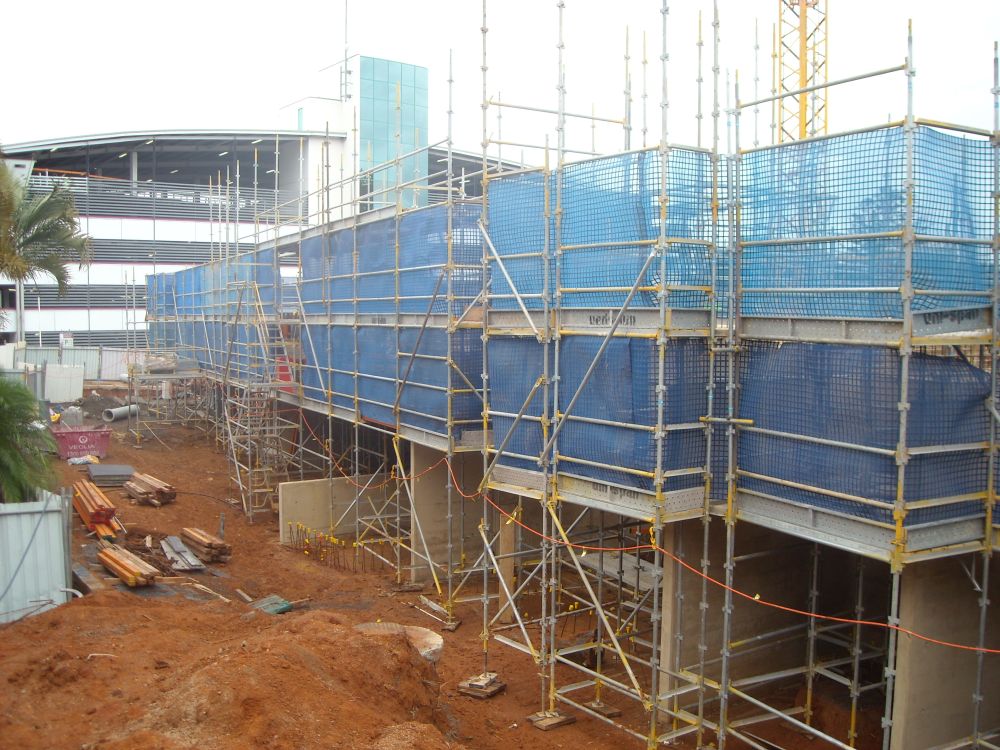 Working on the floors at the construction site of the Caboolture Hub, 4 Hasking Street Caboolture