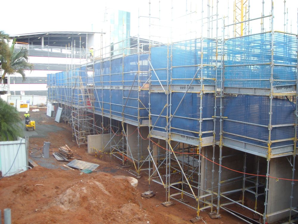 Working on the floors at the construction site of the Caboolture Hub, 4 Hasking Street Caboolture
