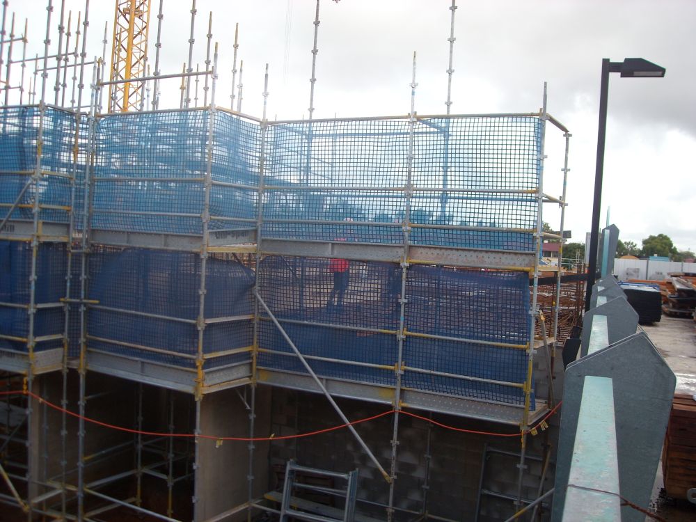 Working on the floors at the construction site of the Caboolture Hub, 4 Hasking Street Caboolture