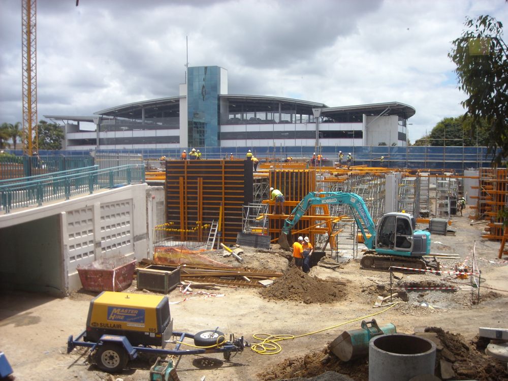 Working on the external walls at the construction site of the Caboolture Hub, 4 Hasking Street Caboolture