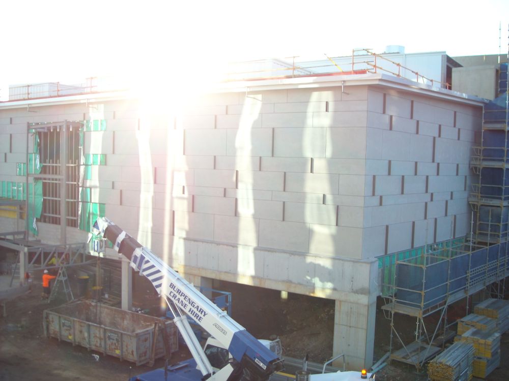 Cladding installed as part of the construction of the building known as the Caboolture Hub, 4 Hasking Street Caboolture 