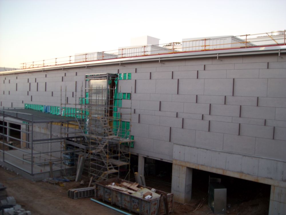 Cladding installed as part of the construction of the building known as the Caboolture Hub, 4 Hasking Street Caboolture 