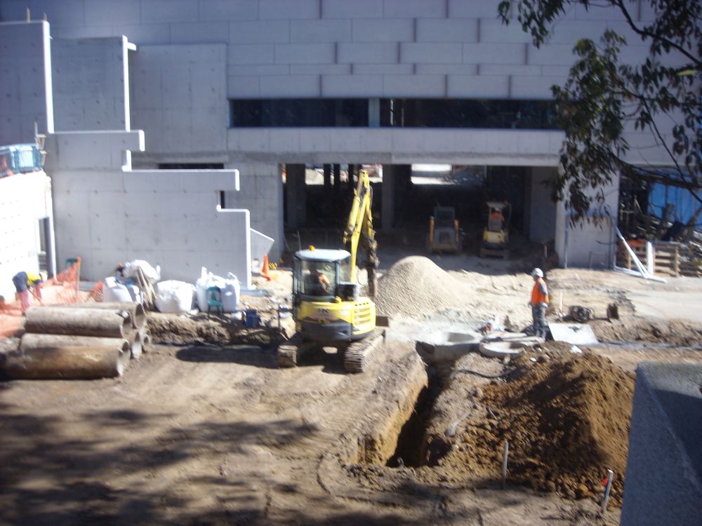 Excavator continues work on the construction of the Caboolture Hub, 4 Hasking Street Caboolture