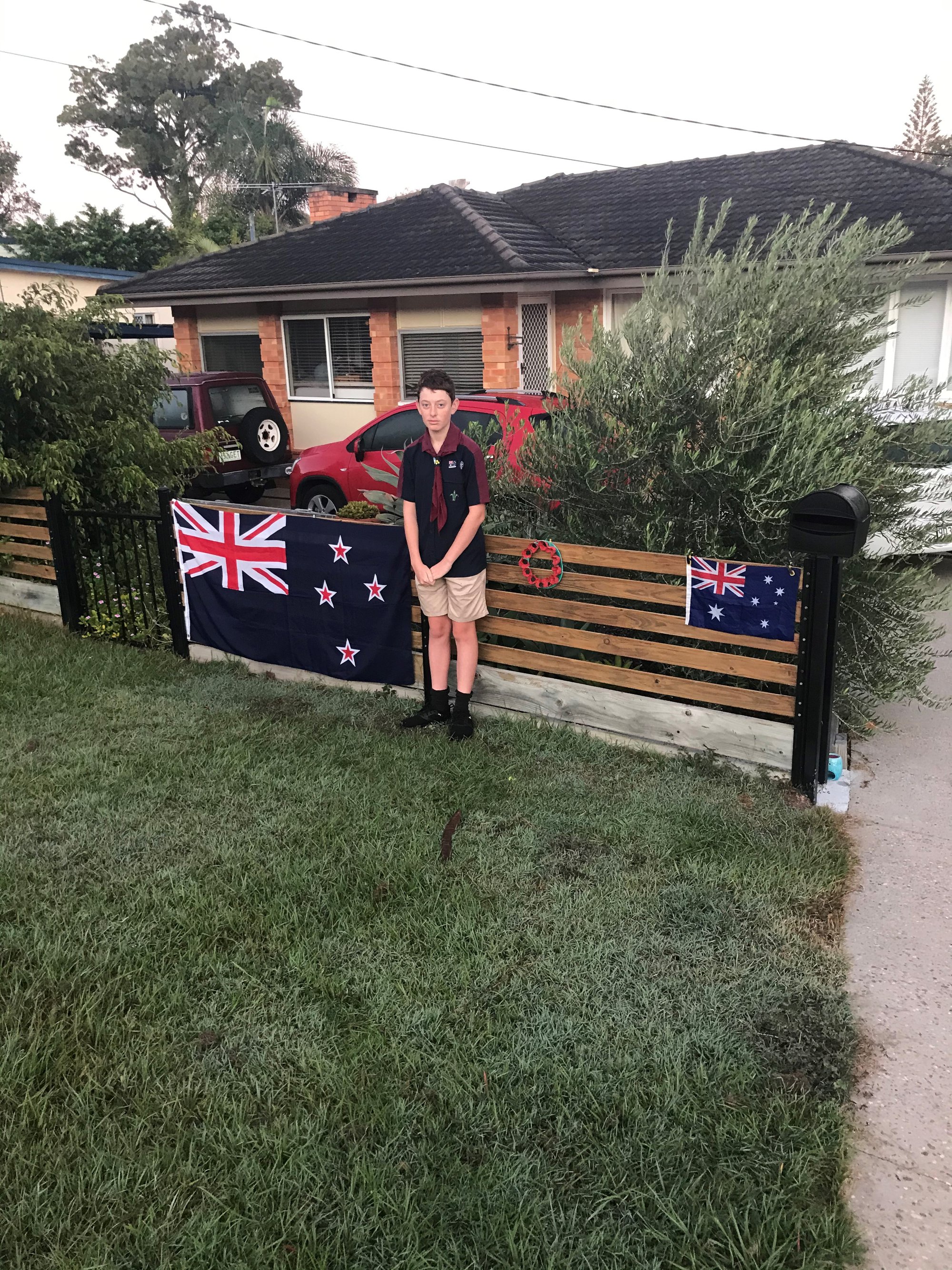 Lucas Street Scarborough - 25 April 2020 - son Spencer in Oyster Point Venturer uniform, driveway Dawn Service