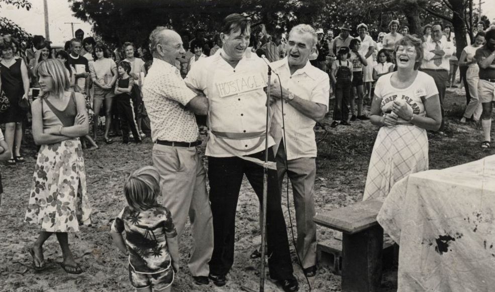 Cr Alex Barr being taken hostage by fellow Councillors during The Independence celebrations