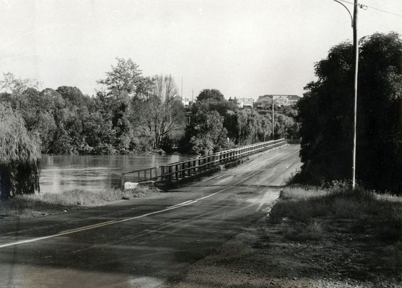 Caboolture River in minor flood at the Caboolture River Bridge in 1970