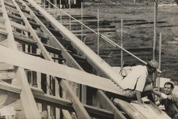 Corrugated iron being laid on the roof