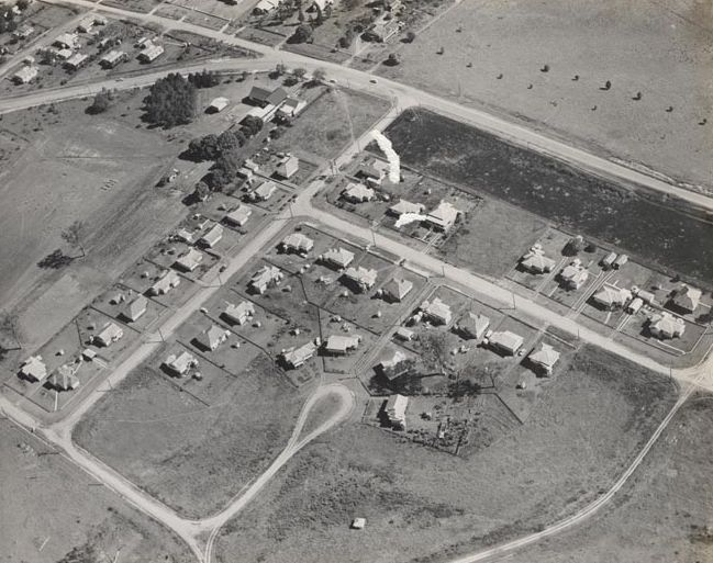 View of housing with Railway line in foreground