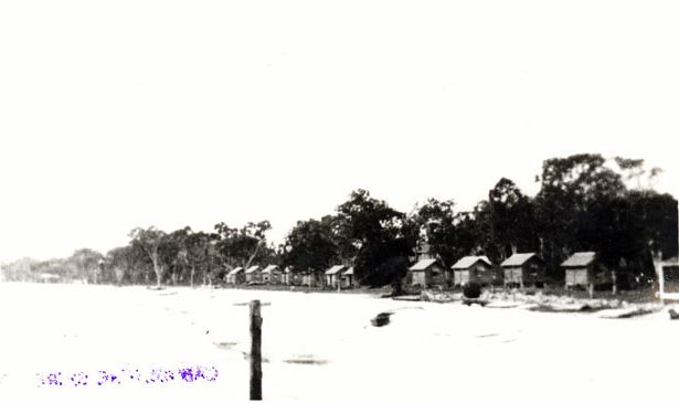 Twelve huts on foreshore on Bribie Island